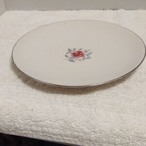 Elegant White Plate with Red Floral Design